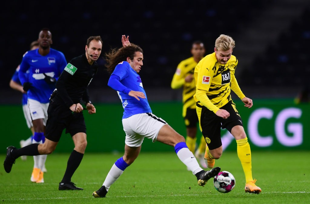 Guendouzi explains why he chose to leave Arsenal for Hertha 2 BERLIN, GERMANY: Julian Brandt (R) of Dortmund is challenged by Matteo Guendouzi of Berlin during the Bundesliga match between Hertha BSC and Borussia Dortmund at Olympiastadion on November 21, 2020. (Photo by Clemens Bilan - Pool/Getty Images)