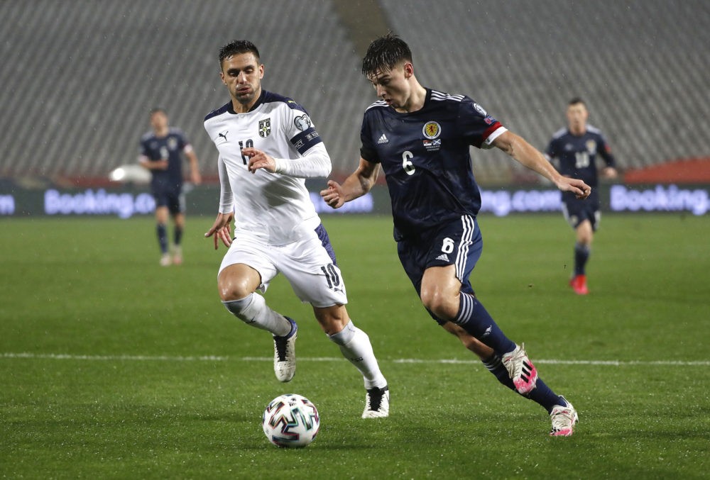 BELGRADE, SERBIA: Kieran Tierney of Scotland looks to break past Dusan Tadic of Serbia during the UEFA EURO 2020 Play-Off Final between Serbia and ...