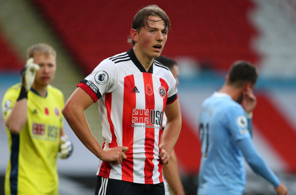 SHEFFIELD, ENGLAND: A poppy is seen on the shirt of Sander Berge of Sheffield United during the Premier League match between Sheffield United and M...