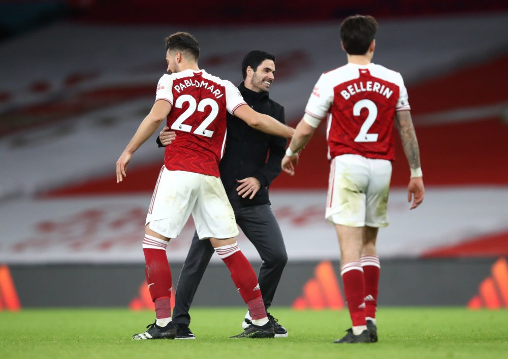 LONDON, ENGLAND: Mikel Arteta, Manager of Arsenal and Pablo Mari of Arsenal celebrate following their team's victory in the Premier League match be...