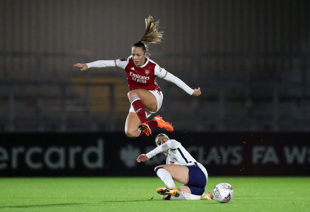 BOREHAMWOOD, ENGLAND - NOVEMBER 18: Lia Waelti of Arsenal is challenged by Alanna Kennedy of Tottenham Hotspur  during the FA Women's Continental League Cup match between Arsenal and Tottenham Hotspur at Meadow Park on November 18, 2020 in Borehamwood, England. Sporting stadiums around the UK remain under strict restrictions due to the Coronavirus Pandemic as Government social distancing laws prohibit fans inside venues resulting in games being played behind closed doors. (Photo by Naomi Baker/Getty Images)