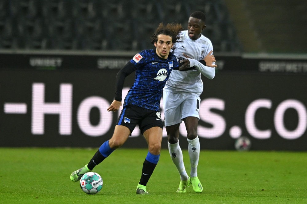 MOENCHENGLADBACH, GERMANY: Matteo Guendouzi of Hertha BSC is challenged by Denis Zakaria of Borussia Monchengladbach during the Bundesliga match be...