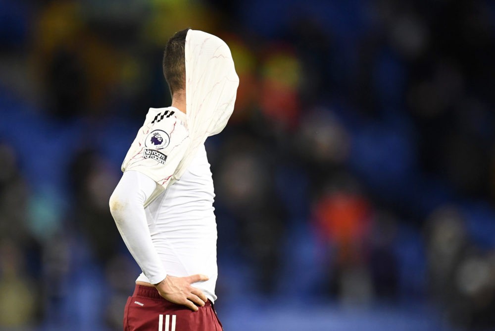 LIVERPOOL, ENGLAND - DECEMBER 19: Dani Ceballos of Arsenal looks dejected following his sides defeat in the Premier League match between Everton an...