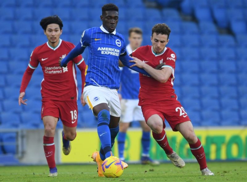 2 summer signings move closer for Arsenal 2 Brighton's Ivorian midfielder Yves Bissouma (C) comes under pressure from Liverpool's Japanese midfielder Takumi Minamino (L) and Liverpool's Portuguese striker Diogo Jota during the English Premier League football match between Brighton and Hove Albion and Liverpool at the American Express Community Stadium in Brighton, southern England on November 28, 2020. (Photo by MIKE HEWITT/POOL/AFP via Getty Images)