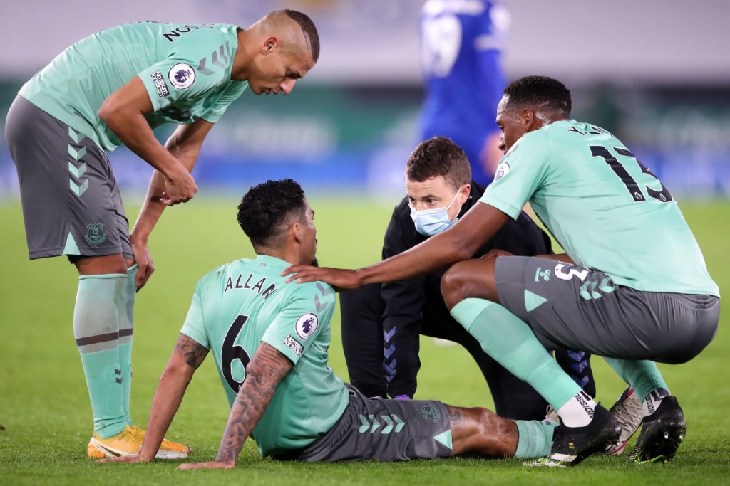 Arsenal boost as Ancelotti rules key Everton trio out 2 Everton's Brazilian midfielder Allan receives medical treatment during the English Premier League football match between Leicester City and Everton at King Power Stadium in Leicester, central England on December 16, 2020. (Photo by ALEX PANTLING/POOL/AFP via Getty Images)
