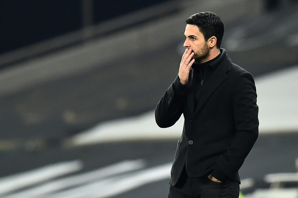 Arsenal's Spanish manager Mikel Arteta reacts during the English Premier League football match between Tottenham Hotspur and Arsenal at Tottenham H...