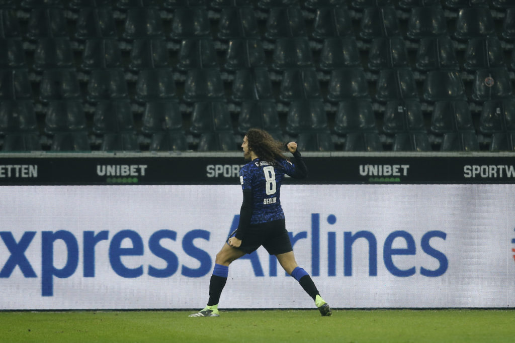 Hertha Berlin's French midfielder Matteo Guendouzi celebrates scoring the opening goal during the German first division Bundesliga football match Borussia Moenchengladbach v Hertha Berlin in Moenchengladbach, western Germany on December 12, 2020. (Photo by LEON KUEGELER / POOL / AFP)