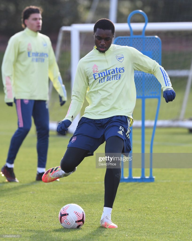 Omar Rekik (L) spotted in the background of a training picture (Photo by David Price)