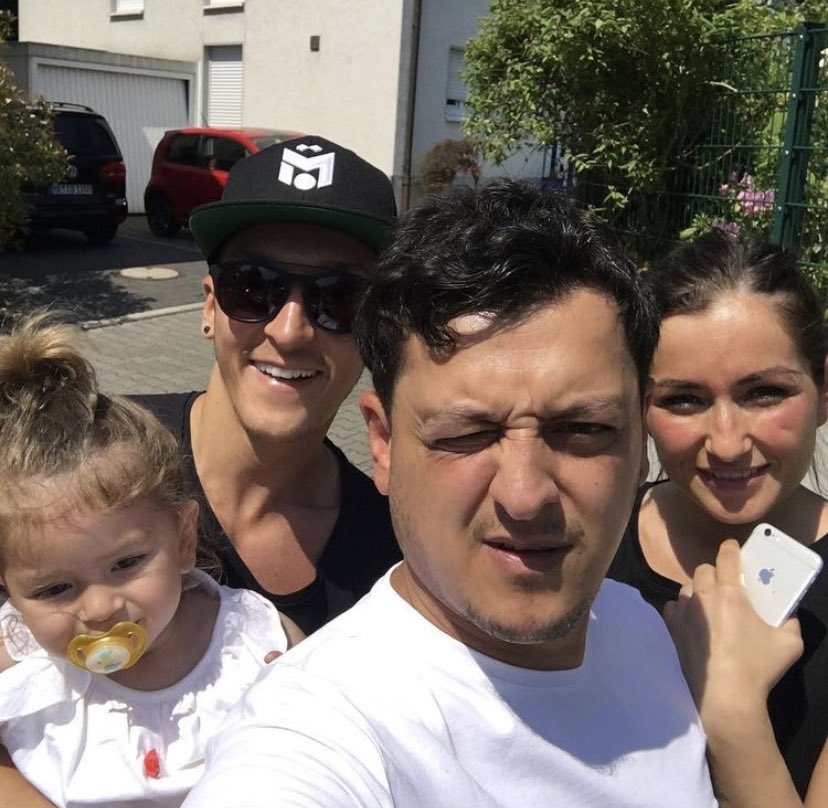 Mesut Özil (2nd from left) with his brother Mutlu (2nd from right)