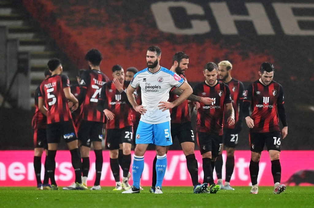 BOURNEMOUTH, ENGLAND: Jack Wilshere of AFC Bournemouth celebrates with his team mates after scoring their team's first goal as Joe McNerney of Crawley Town reacts during The Emirates FA Cup Fourth Round match between AFC Bournemouth and Crawley Town at Vitality Stadium on January 26, 2021. (Photo by Dan Mullan/Getty Images)