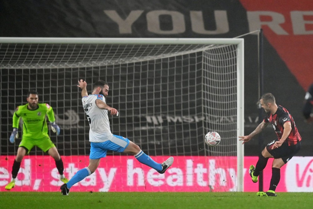 BOURNEMOUTH, ENGLAND: Jack Wilshere of AFC Bournemouth scores their team's first goal during The Emirates FA Cup Fourth Round match between AFC Bou...