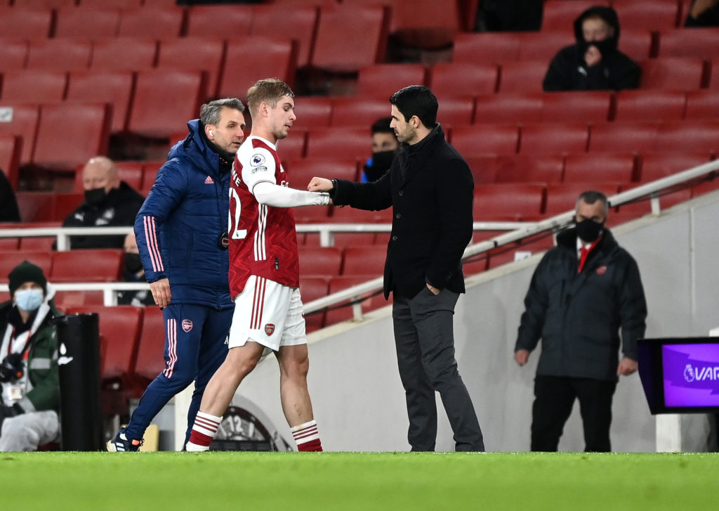 Emotional: Arteta and Smith Rowe on Smith Rowe’s Arsenal return 4 LONDON, ENGLAND - JANUARY 18: Emile Smith Rowe of Arsenal interacts with Mikel Arteta, Manager of Arsenal after being substituted off during the Premier League match between Arsenal and Newcastle United at Emirates Stadium on January 18, 2021 in London, England. Sporting stadiums around England remain under strict restrictions due to the Coronavirus Pandemic as Government social distancing laws prohibit fans inside venues resulting in games being played behind closed doors. (Photo by Shaun Botterill/Getty Images)