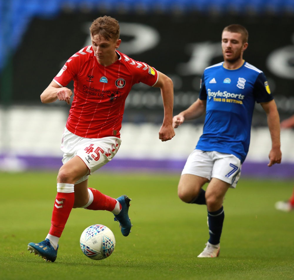 BIRMINGHAM, ENGLAND - JULY 15: Alfie Doughty of Charlton Athletic breaks away from Dan Crowley during the Sky Bet Championship match between Birmin...