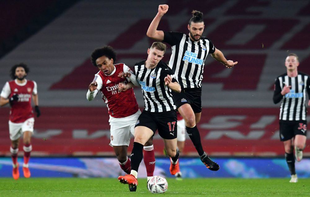 Arsenal fans' brutal comments when Willian replaced Smith Rowe 3 Arsenal's Brazilian midfielder Willian vies with Newcastle United's Swedish defender Emil Krafth (C) and Newcastle United's English striker Andy Carroll (R) during the English FA Cup third round football match between Arsenal and Newcastle United at the Emirates Stadium in London on January 9, 2021. (Photo by Glyn KIRK / AFP)