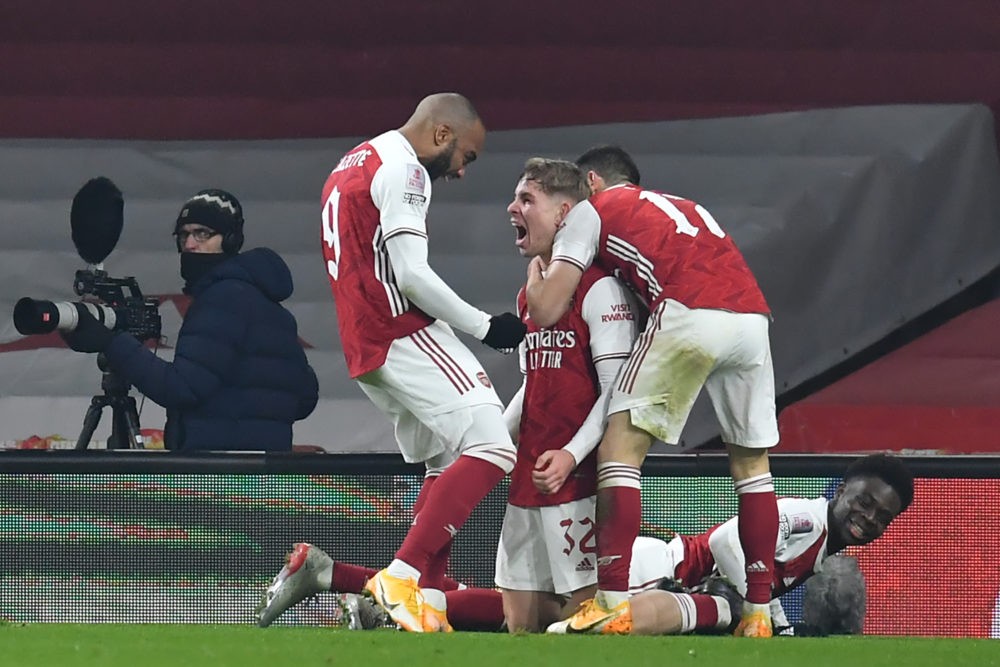How many trophies have this Arsenal squad won? 2 Arsenal's English midfielder Emile Smith Rowe (C) celebrates with teammates after scoring the opening goal of the English FA Cup third round football match between Arsenal and Newcastle United at the Emirates Stadium in London on January 9, 2021. (Photo by Glyn KIRK / AFP)
