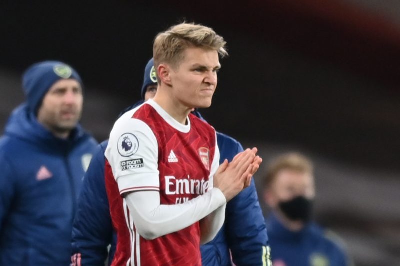 Arsenal's Norwegian midfielder Martin Odegaard prepares to come on as a substitute during the English Premier League football match between Arsenal...