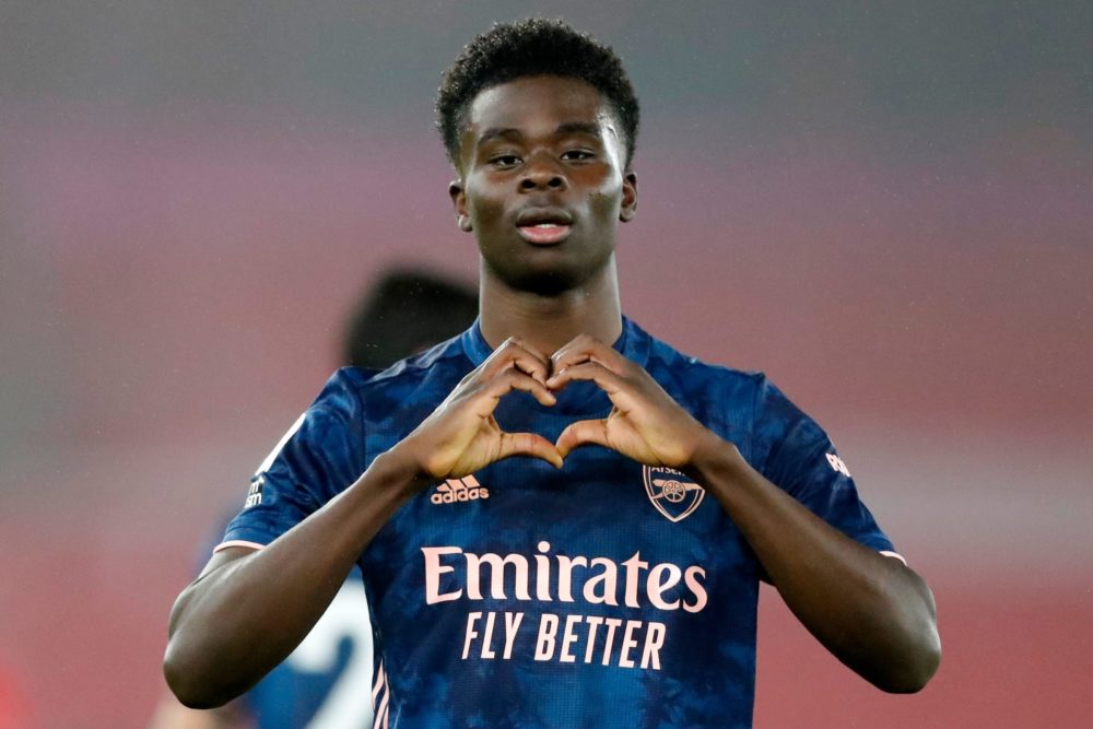 Arsenal's English striker Bukayo Saka celebrates scoring his team's second goal during the English Premier League football match between Southampto...