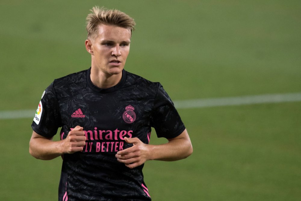 Real Madrid's Norwegian midfielder Martin Odegaard reacts during the Spanish league football match Real Betis against Real Madrid CF at the Benito ...