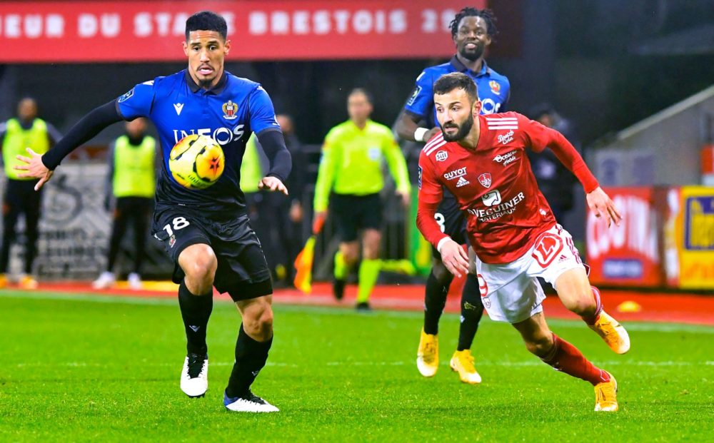 Brest's French forward Franck Honorat (R) fights for the ball with Nice's French forward William Saliba during during the French L1 football match ...