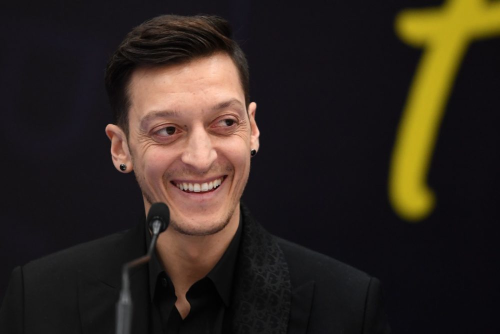 Arsenal's former German midfielder Mesut Ozil attends the signing cerenomy of his new contract with the Turkish football club Fenerbahce at the Div...