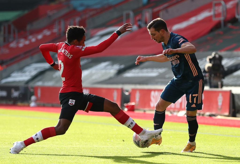 Ornstein confirms Southampton 25yo on Arsenal shortlist 2 SOUTHAMPTON, ENGLAND: Cedric Soares of Arsenal is challenged by Kyle Walker-Peters of Southampton during The Emirates FA Cup Fourth Round match between Southampton FC and Arsenal FC on January 23, 2021. (Photo by Catherine Ivill/Getty Images)