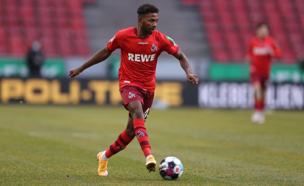COLOGNE, GERMANY: Emmanuel Dennis of Cologne runs with the ball during the Bundesliga match between 1. FC Koeln and DSC Arminia Bielefeld at RheinE...