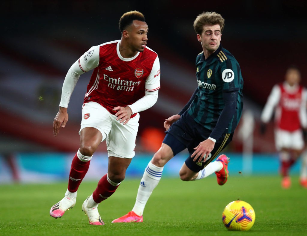 Arsenal v Leeds United - Arsenal's Gabriel Magalhaes and Leeds United's Patrick Bamford battle for the ball during the Premier League match at The Emirates Stadium, London. Picture date: Sunday February 14, 2021. Copyright: Julian Finney