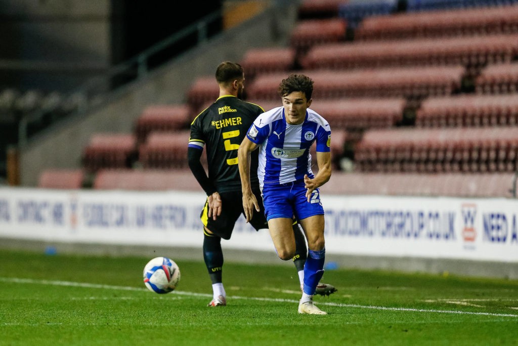 Arsenal chase 19-year-old Wigan striker Kyle Joseph 2 Wigan Athletic v Bristol Rovers EFL Sky Bet League 1 24/11/2020. Wigan Athletic FC Forward Kyle Joseph beats Bristol Rovers FC Defender and Captain Max Ehmer with the ball during the EFL Sky Bet League 1 match between Wigan Athletic and Bristol Rovers at the DW Stadium, Wigan, England on 24 November 2020. Copyright: James Heaton