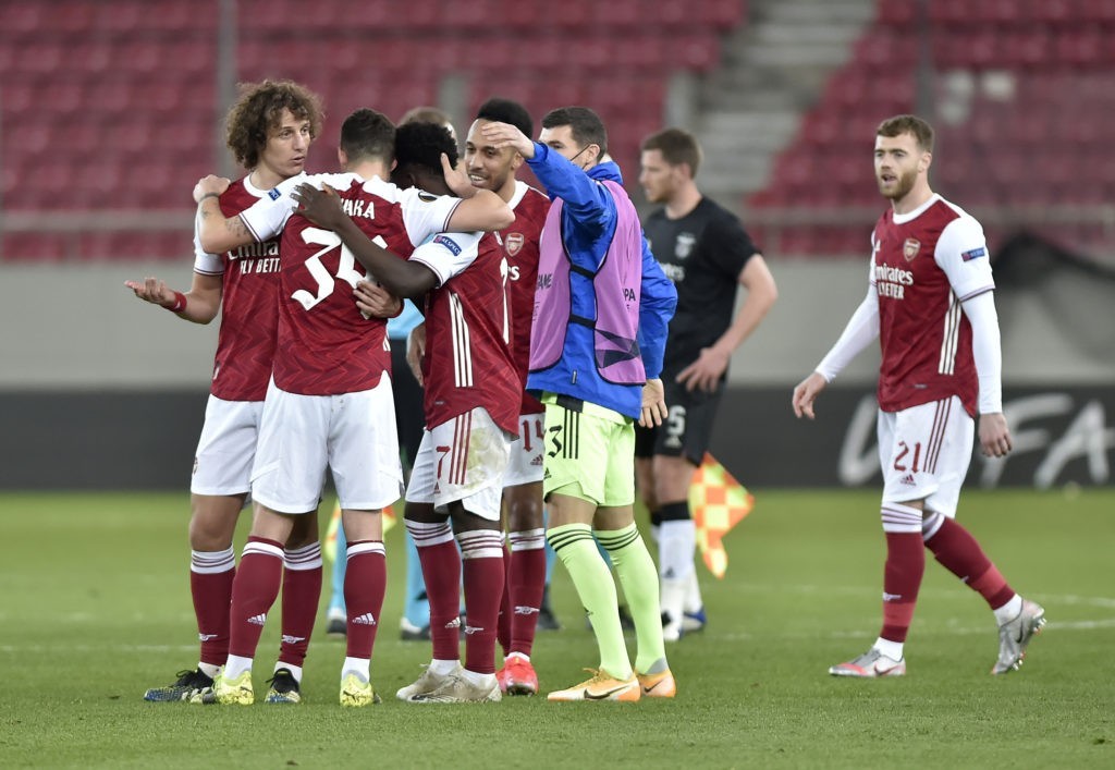 PIRAEUS, GREECE - FEBRUARY 25: David Luiz, Granit Xhaka Bukayo Saka, Pierre-Emerick Aubameyang and Mat Ryan of Arsenal celebrate following their team's victory in the UEFA Europa League Round of 32 match between Arsenal FC and SL Benfica at Karaiskakis Stadium on February 25, 2021 in Piraeus, Greece. Arsenal face SL Benfica at a neutral venue in Piraeus behind closed doors to prevent the spread of Covid-19 variants. (Photo by Milos Bicanski/Getty Images)