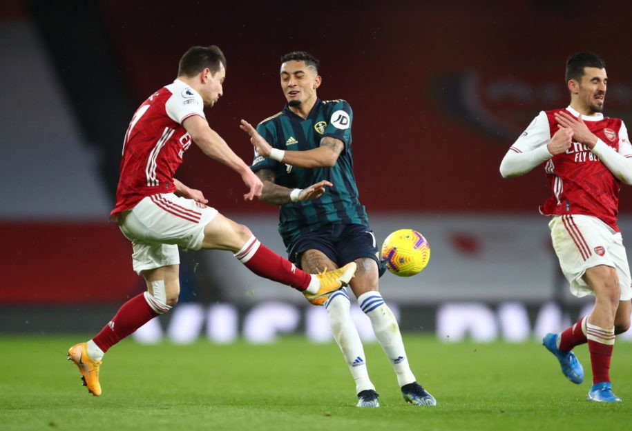LONDON, ENGLAND: Cedric Soares of Arsenal is challenged by Raphinha of Leeds United during the Premier League match between Arsenal and Leeds Unite...