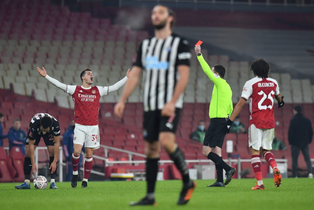 Frustration at ref selection for Arsenal's game at Fulham 8 English referee Chris Kavanagh shows a red card to Arsenal's English midfielder Emile Smith Rowe (not pictured) which he changed to yellow after a review during the English FA Cup third round football match between Arsenal and Newcastle United at the Emirates Stadium in London on January 9, 2021. (Photo by Glyn KIRK / AFP)