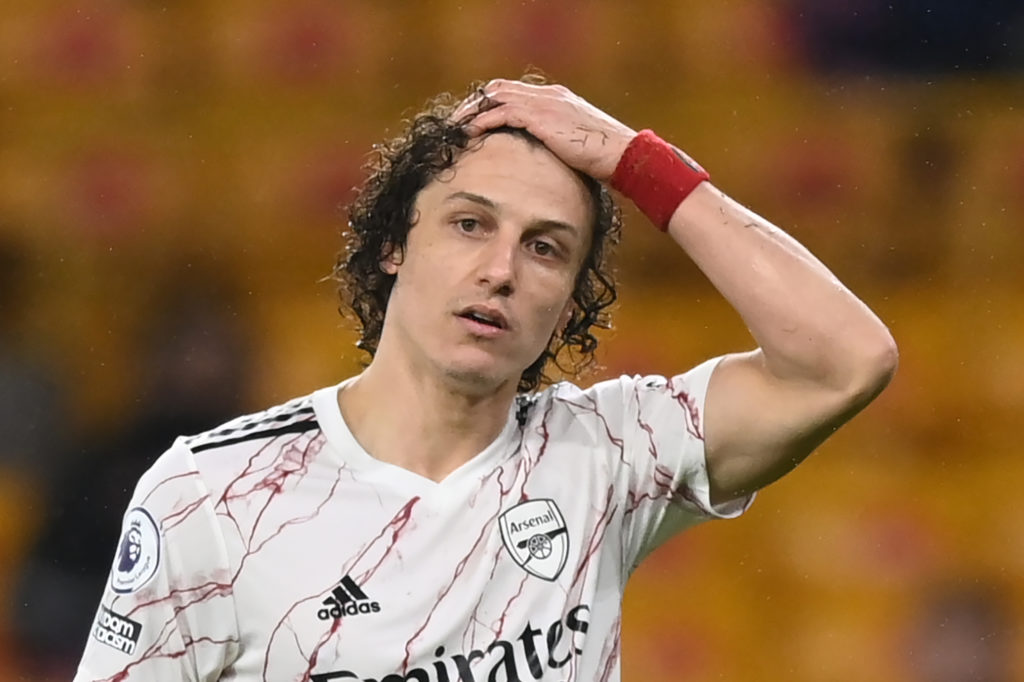 Arsenal's Brazilian defender David Luiz waits for a red card decision during the English Premier League football match between Wolverhampton Wanderers and Arsenal at the Molineux stadium in Wolverhampton, central England on February 2, 2021. (Photo by Shaun Botterill / POOL / AFP)