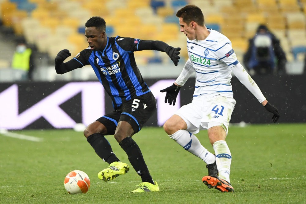 Club Brugge's Ivorian defender Odilon Kossounou and Dynamo Kiev's Ukrainian forward Artem Biesiedin vie for the ball during the UEFA Europa League ...