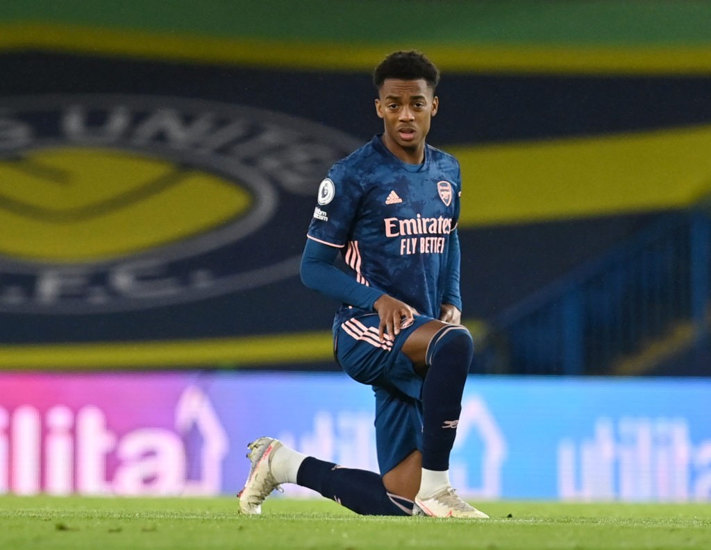 LEEDS, ENGLAND - NOVEMBER 22: Joe Willock of Arsenal takes the knee ahead of kick off during the Premier League match between Leeds United and Arsenal at Elland Road on November 22, 2020 in Leeds, England. Sporting stadiums around the UK remain under strict restrictions due to the Coronavirus Pandemic as Government social distancing laws prohibit fans inside venues resulting in games being played behind closed doors. (Photo by Paul Ellis - Pool/Getty Images)