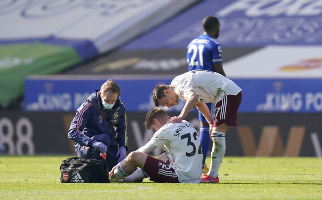 LEICESTER, ENGLAND: Emile Smith Rowe of Arsenal receives medical attention during the Premier League match between Leicester City and Arsenal at The King Power Stadium on February 28, 2021. (Photo by Tim Keeton - Pool/Getty Images)