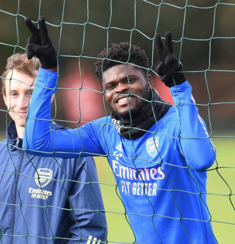 Thomas Partey watching on at Arsenal training