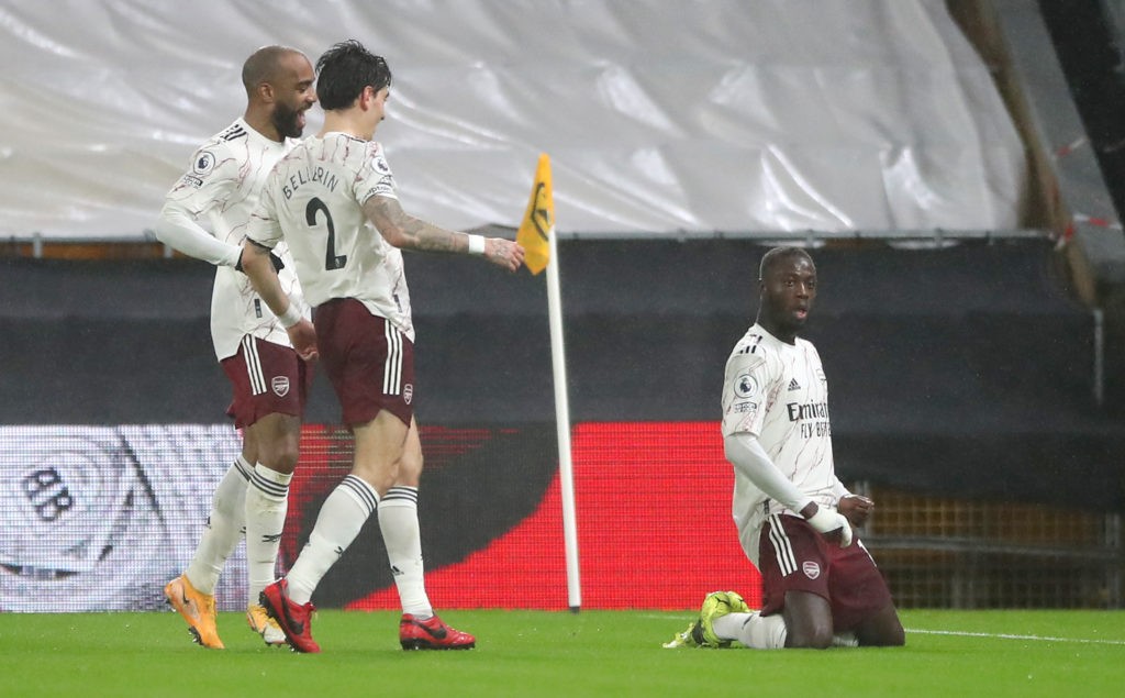Thomas Partey injured: How Arsenal lined up vs Aston Villa 7 WOLVERHAMPTON, ENGLAND: Nicolas Pepe of Arsenal celebrates with team mates (L-R) Alexandre Lacazette and Hector Bellerin of Arsenal after scoring their side's first goal during the Premier League match between Wolverhampton Wanderers and Arsenal at Molineux on February 02, 2021. (Photo by Nick Potts - Pool/Getty Images)