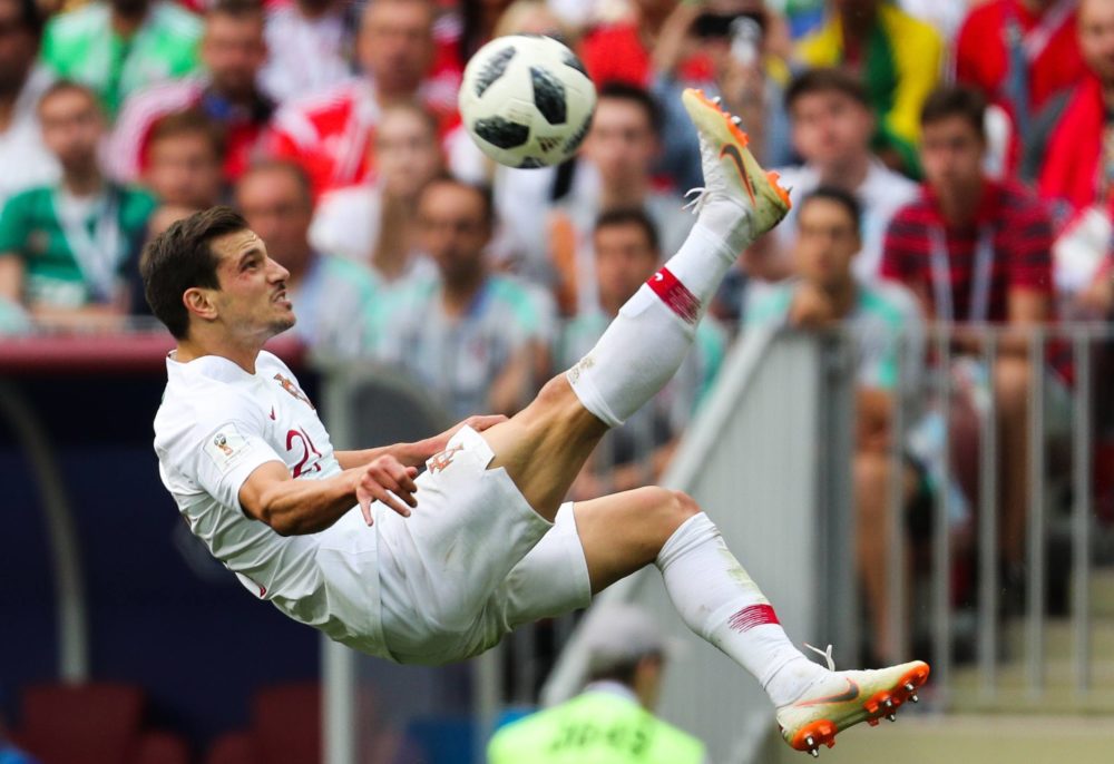 JUNE 20, 2018: Portugal's Cedric Soares kicks the ball in their 2018 FIFA World Cup match against Morocco at Luzhniki Stadium. Photo: Mikhail Teres...