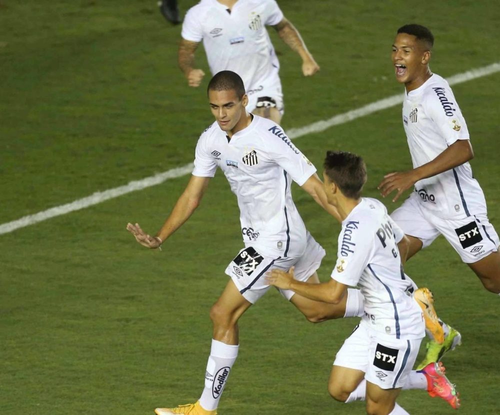 Kaiky Fernandes (C) of Santos celebrates after scoring during the Copa Libertadores soccer match between Santos and Deportivo Lara at Vila Belmiro ...
