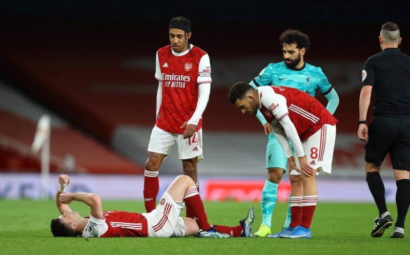 Arsenal v Liverpool - Premier League - Emirates Stadium Arsenal's Kieran Tierney lies injured before being substituted during the Premier League match at The Emirates Stadium, London. Saturday April 3, 2021. Copyright: Julian Finney
