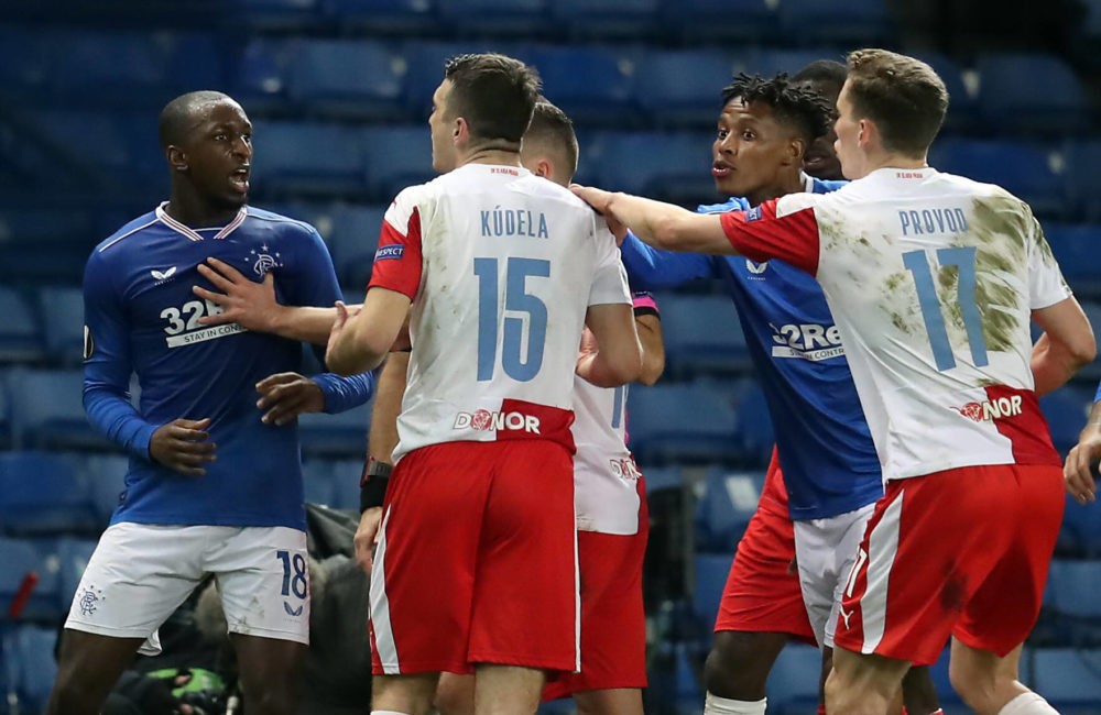 Rangers' Glen Kamara (left) argues with Slavia Prague's Ondrej Kudela during the UEFA Europa League Round of Sixteen match at Ibrox Stadium, Glasgow. Issue date: Tuesday, April 6, 2021. Copyright: Andrew Milligan
