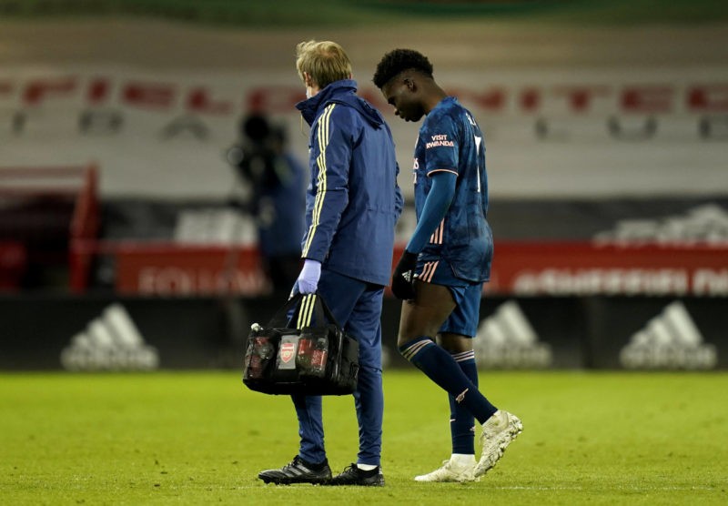 Sheffield United v Arsenal - Premier League - Bramall Lane Arsenal s Bukayo Saka leaves the pitch with an injury during the Premier League match at...