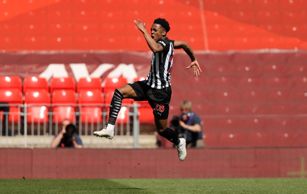 Newcastle United's Joe Willock celebrates scoring his side's first goal of the game during the Premier League match at Anfield, Liverpool. Picture ...