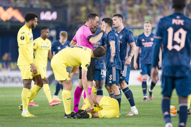 April 29, 2021, Villarreal, Spain: Artur Soares Dias referee and Etienne Capoue, Pau Francisco Torres, Dani Parejo of Villarreal CF and Daniel Ceballos Fernandez, Granit Xhaka of Arsenal FC react during the UEFA Europa League Semi Final First Leg football match between Villarreal and Arsenal at Estadio de la Ceramica. Villarreal Spain Copyright: Xisco Navarro