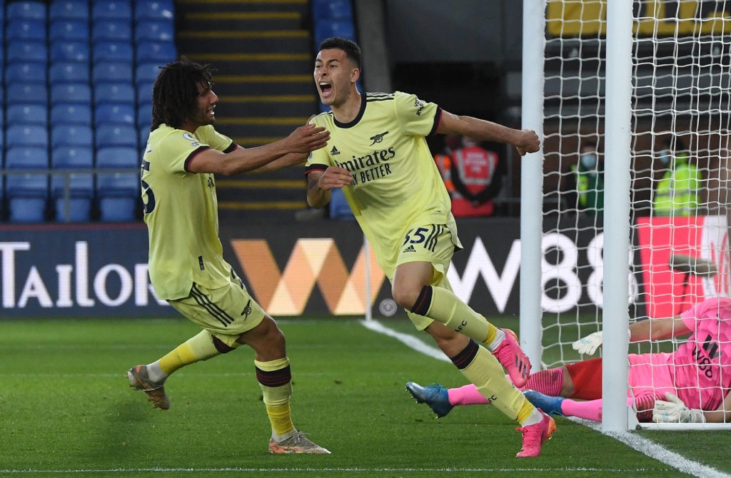 Arsenal's Gabriel Martinelli right celebrates with Mohamed Elneny after scoring their side's second goal of the game during the Premier League match at Selhurst Park, London. Picture date: Wednesday, May 19, 2021. Copyright: Facundo Arrizabalaga