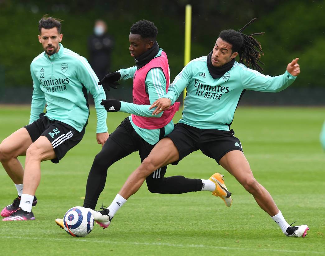 Miguel Azeez makes a tackle on Eddie Nketiah in training with Arsenal (Photo via Arsenal.com)