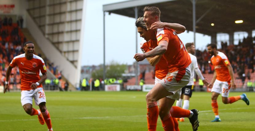 Daniel Ballard (R) celebrates a goal in Blackpool's play-off semi-final (Photo via BlackpoolFC.co.uk)