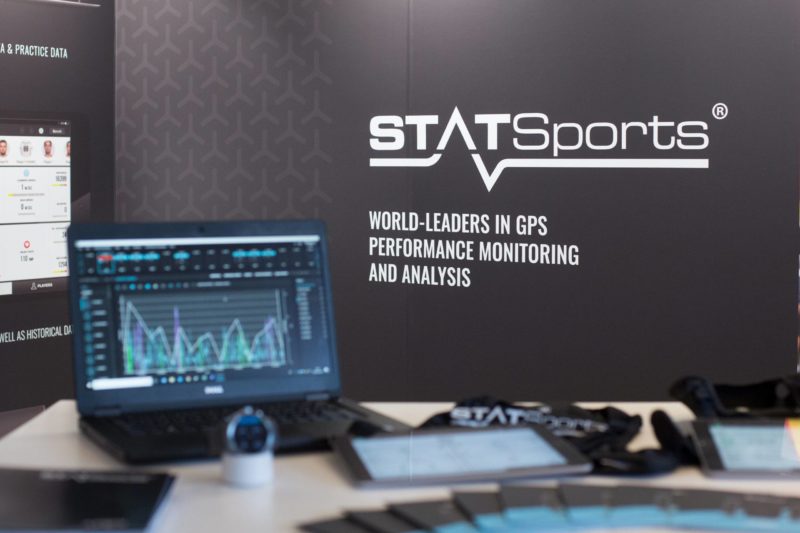 Stand with a laptop with performance data of an athlete in front of the logo of the company STATSports which offers performance diagnostics and ana...