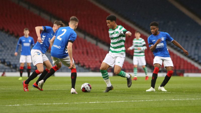 Armstrong Oko-Flex of Celtic brushes off the challenge of Ben Williamson ActionPlus12127388 Vagelis Georgariou
