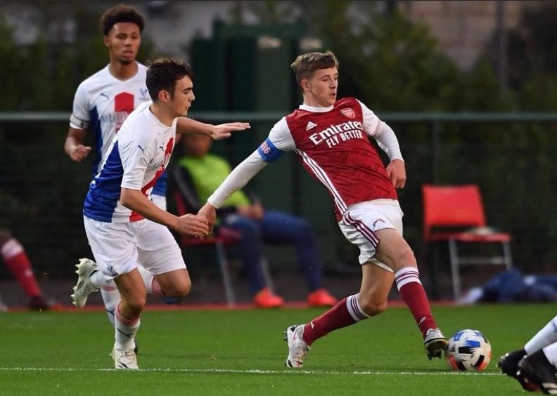 Sydie Peck with Arsenal (Photo via Peck on Instagram)
